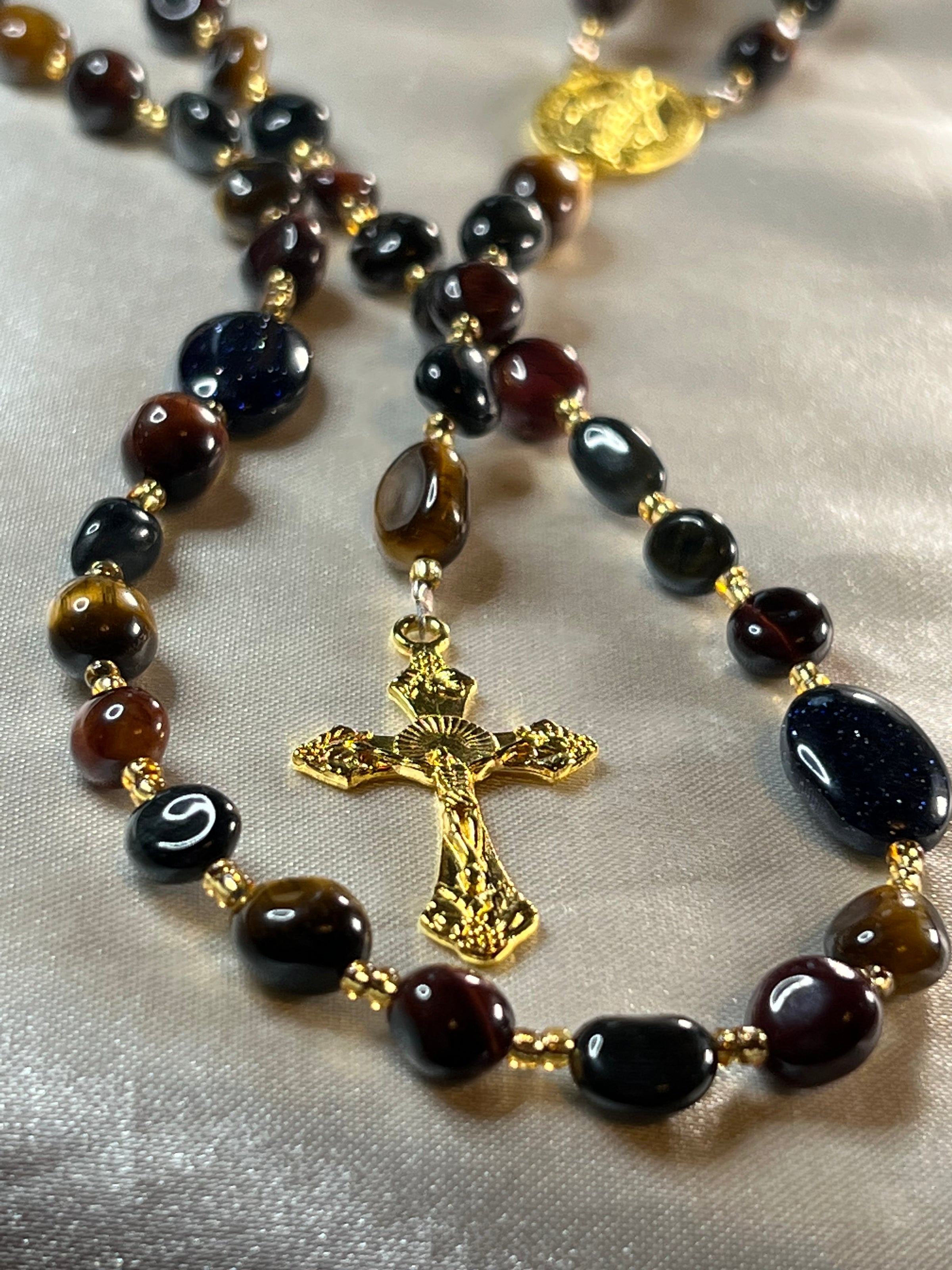 The September Rosary is made with Natural Stones. Each stone feels different going through your fingers.