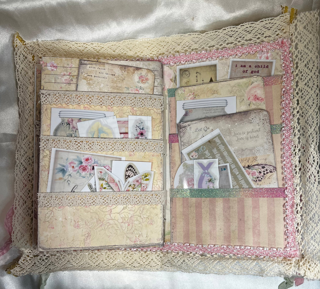 Back pages of the journal pockets are trimmed with lace and ribbons. The pockets are full of stickers and journaling note cards!!