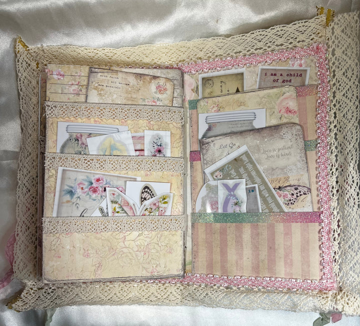 Back pages of the journal pockets are trimmed with lace and ribbons. The pockets are full of stickers and journaling note cards!!